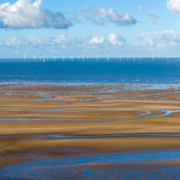 Wind turbines in the Irish Sea off the Wirral coast, England