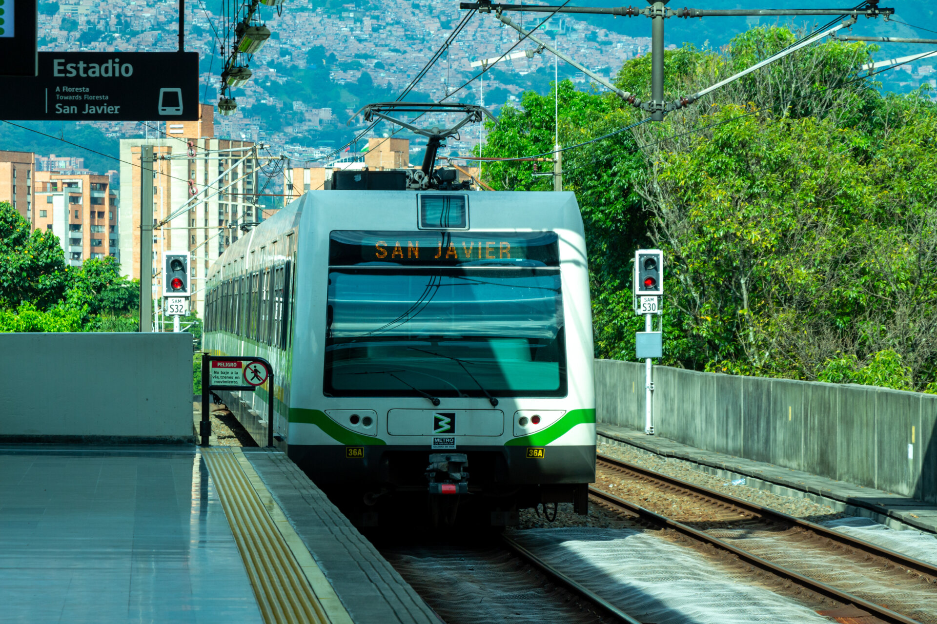 Medellin, Medellín, Antioquia, Colombia, 08 06 2023 : platform of the metro Estadio with a train arriving into the station.